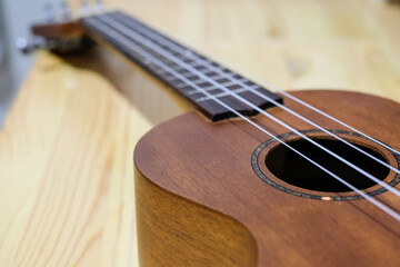 close up short of hawaii traditional string instrument called ukulele, good for flok song hobby and...