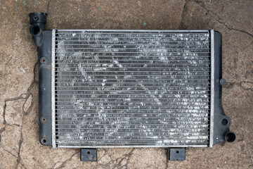 old broken car radiator