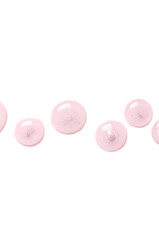 Pink drops of gel closeup. Cosmetic product for moisturizing the skin of the face or body. Copy space.