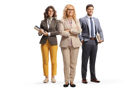 Full Length Portrait Of A School Principal And Male And Female Teacher Holding Books