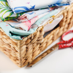 Obraz premium Lots of colorful fabrics. Palettes. Needlework. Atelier and sewing. cotton textile - close up of fabric texture. Cotton Fabric Texture.