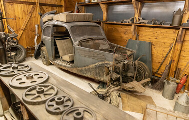 Rusty car in garage