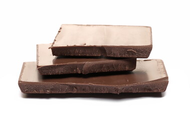 Dark chocolate with cocoa bars, pieces isolated on white  