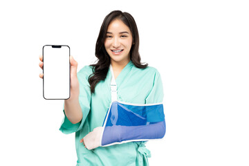 Injured Young woman put on soft splint due to a broken arm show white screen on smart phone...
