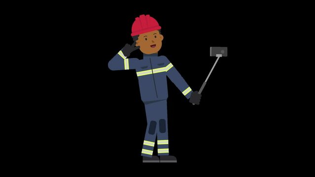 Black male firefighter taking a selfie with a selfie stick and posing