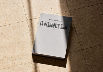 A4 Linen Book Mockup with Shadows
