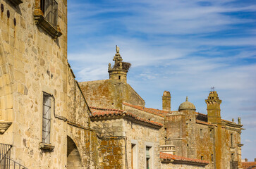 Fototapeta na wymiar Little towers of the San Carlos palace in Trujillo, Spain