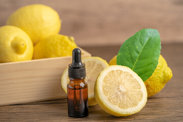 Lemon ripe fresh fruit with leaf on wooden background with copy space