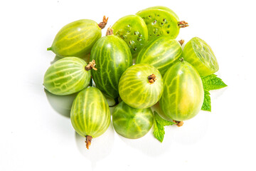 Gooseberry with leaf isolated on white.