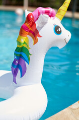 inflatable circle in the form of a unicorn in the pool © borispain69
