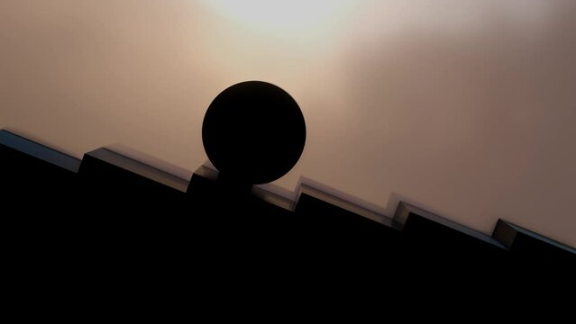 Round object rolling down the stairs. Abstract minimalism 3D render seamless loop 4K animation.