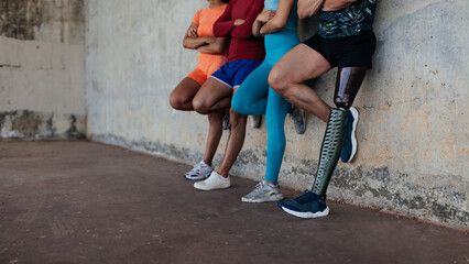 Legs of diverse athletes close up