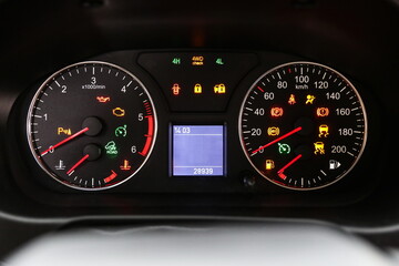 car dashboard with lights symbols  close up