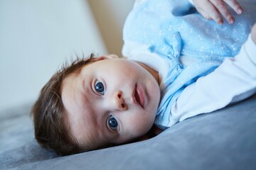 A small newborn baby boy. The concept of childhood