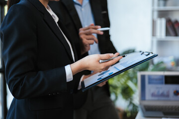 Close up of hands are working and brainstorming on paperworks about business financial and marketing.