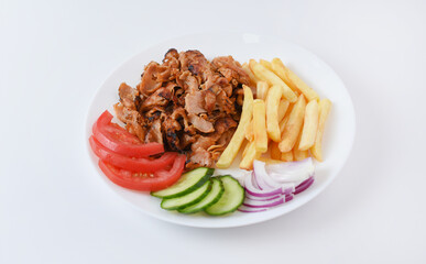 Doner salad plate, kebab chicken meat on white plate. Turkish food. Isolated on white background. 