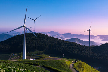 Wind turbines landscape on top of alpine region at beautiful sunrise. Taebaek-si, Gangwon-do, South...