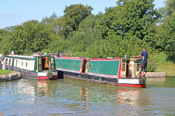 Narrow boats in the Caen Hill canal locks, Devizes, England