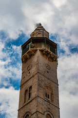 the tower of the church against the sky	
