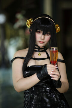 Portrait of a beautiful young woman Cosplay with Spy dress