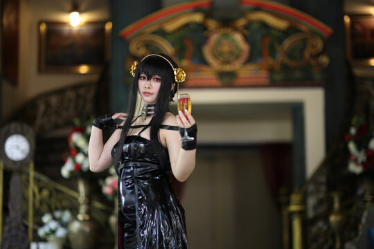 Portrait of a beautiful young woman Cosplay with Spy dress