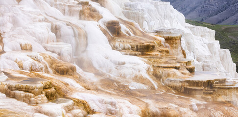 Hot Spring Landscape with colorful ground formation. Mammoth Hot Springs, Yellowstone National Park, Wyoming, United States. Nature Background.