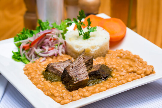 Frejoles con seco beans and meat stew de carne traditional peruvian food