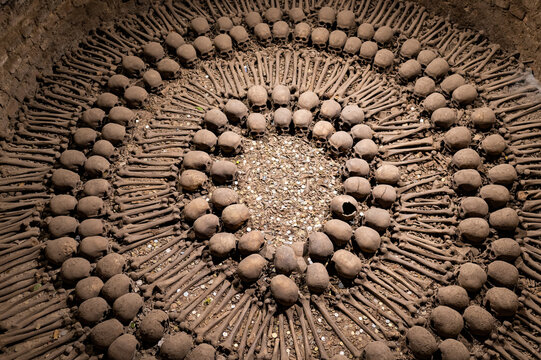 Skulls and bones arranged in Lima catacombs, Peru.