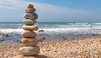 Fotobehang Zen Stenen Cairn at beach on sunny afternoon.  © EDGE DIGITAL IMAGING