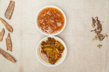 Chutney and Pickel served in a dish isolated on table top view of indian spices food