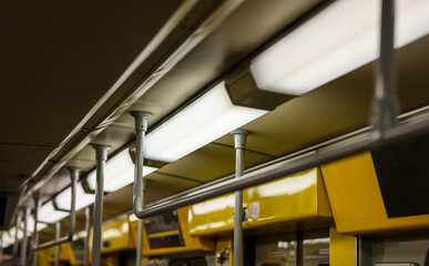 Handrails inside the subway train.