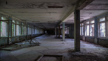 Inside destroyed abandoned building House of Culture Energetik in ghost city Pripyat after...