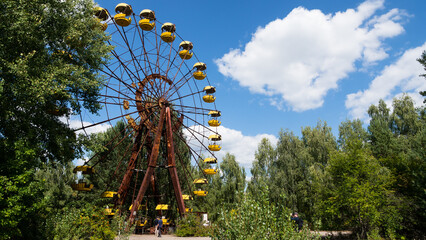 Ferris wheel in the ghost city of Pripyat after explosion of the fourth reactor Chernobyl nuclear...