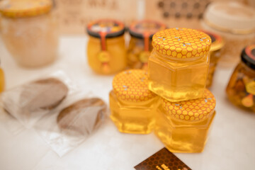Three jars of honey on the table