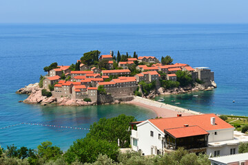 Naklejka na ściany i meble Sveti Stefan, Montenegro. Old historical town and luxury resort on the island. Montenegro, Europe
