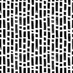 Seamless pattern with vertical charcoal straight lines. Parallel vertical bold dashes and square dots. Black paint dry brushstrokes. Abstract vector background in tribal style. Monochrome ornament. 