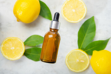 Lemon Essential Oil In A Bottle Withlemon Essential Oil In A Bottle With Lemon On The Side