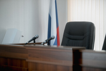 A courtroom in a Russian court, an empty judge
