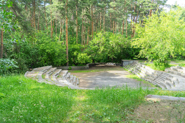 Small stone amphitheater in the city park Stone tents, Yekaterinburg, Russia - obrazy, fototapety, plakaty