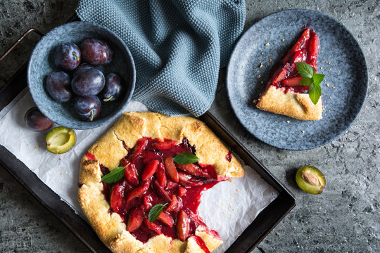Traditional Galette pie filled with plums