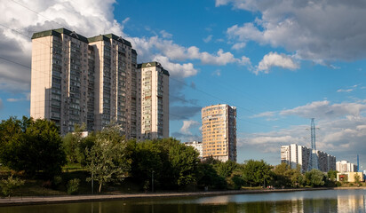 Fototapeta na wymiar High-rise buildings near the Big Chertanovsky Pond in Moscow