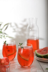Watermelon cocktail with lemon and mint. Refreshing lemonade close up