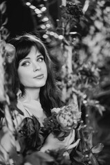 fabulous. a beautiful and gentle woman in peony flowers. black-and-white 