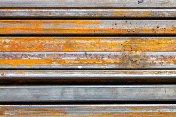 Pile of shaped metal pipes, metal building material