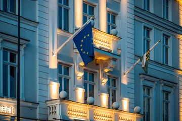 Poster EU flag on government building, illuminated EC flag © Vladyslav