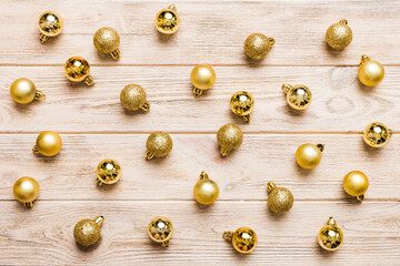 Christmas composition. a pattern of christmas balls on colored background. Flat lay, top view New year decor