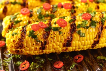 Fotobehang Chili Pepers mexican hot grilled corn with chili pepper and cilantro close up.  © Igor Dudchak