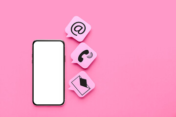Mobile phone with blank screen and icons on pink background