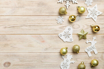 New Year composition white christmas snowflakes. Christmas decor background with pine cones. Top view with copy space