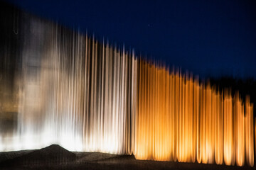 abstract background of motion blurred lights at night